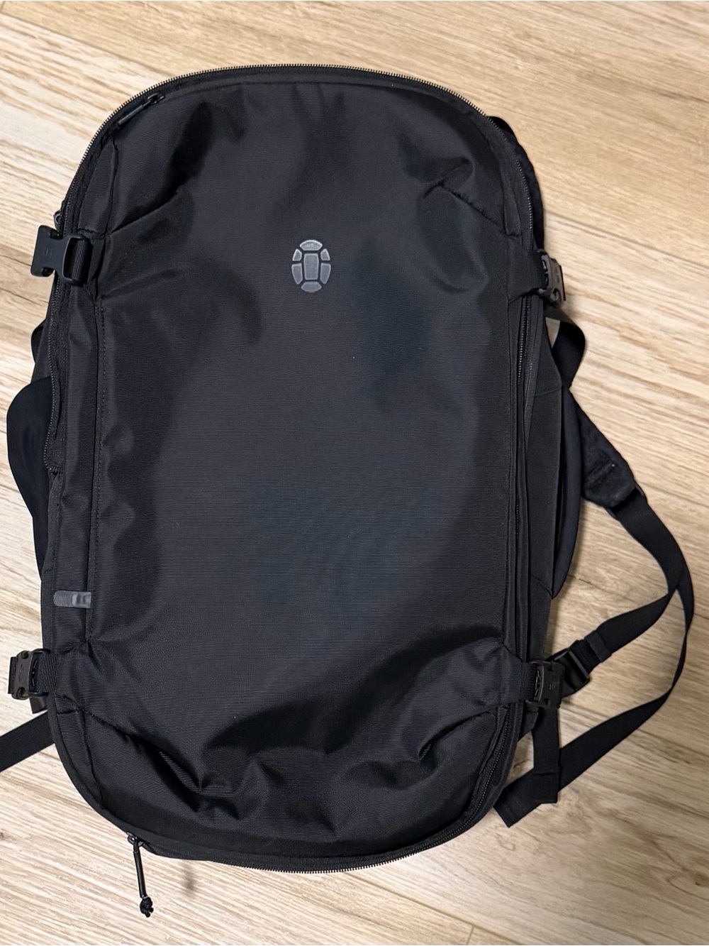 Tortuga 27-32.5L Expandable Travel Backpack Black